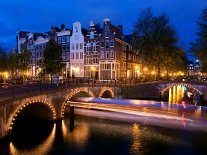 Europe, Netherlands, Holland, Amsterdam, traditional Gabled houses and bridges on the corner of Keizersgracht and Leidesegracht