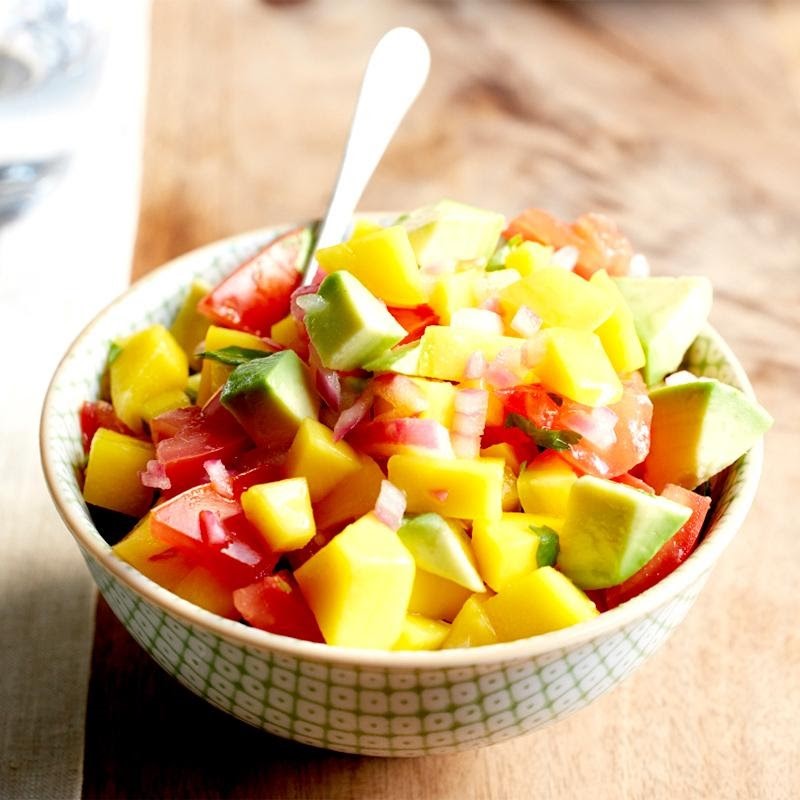 Photo of white bowl with mango-avacado salsa