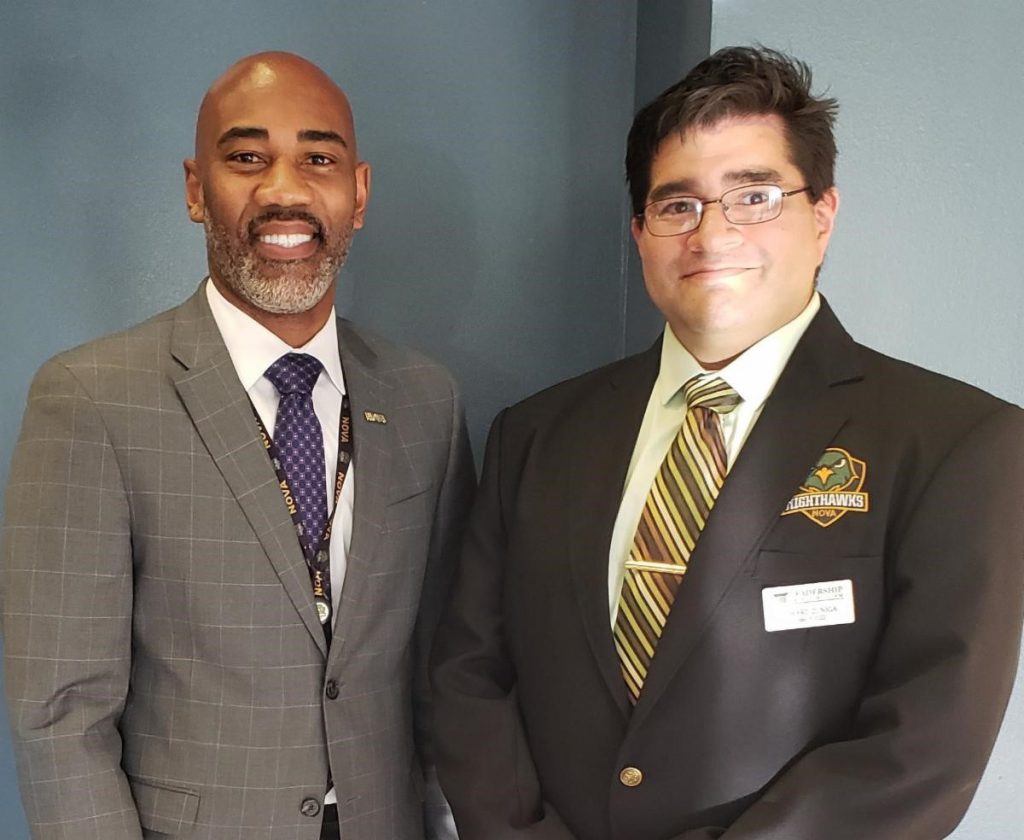 Dr. Richmond Hill, interim provost of NOVA Woodbridge Campus, poses with Ed Zuniga