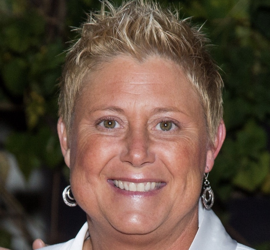 Photo of a smiling Kelly Cochran-Yzquierdo