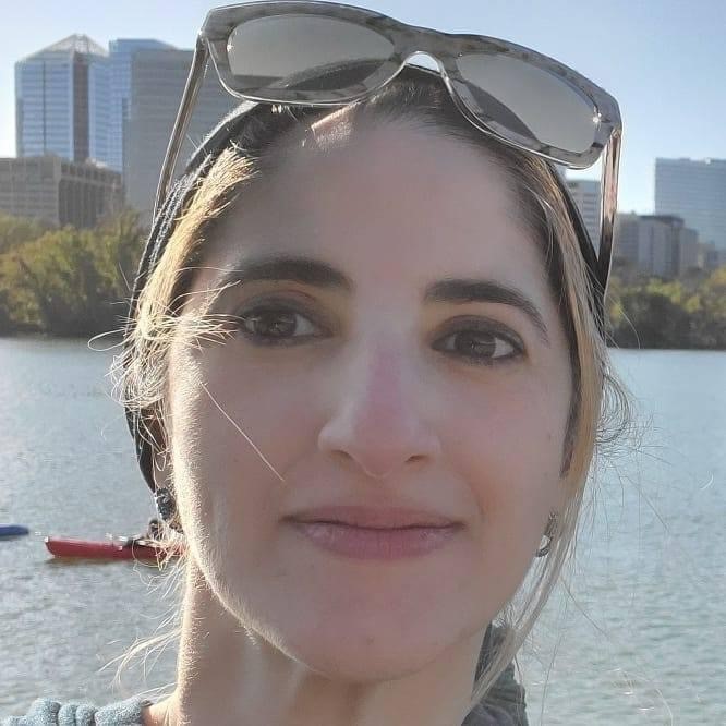 Sana Hilmi pauses against the D.C. waterfront