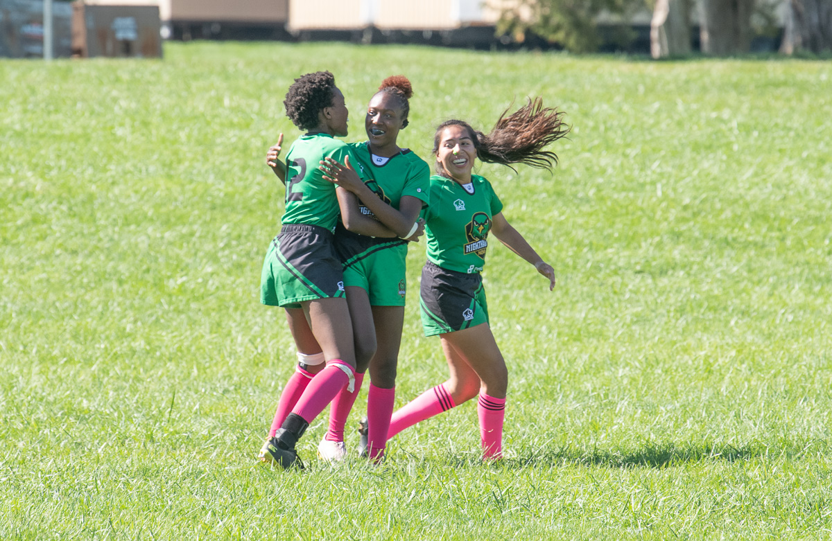 Members of the women's rugby team celebrate their win!