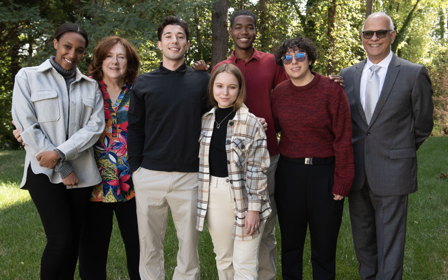 The team poses on a beautiful fall day. Left to right pictured: Fatima Behir, Lucy Holsonbake, Thomas , Sofiya Dengub, Asher Moore, Nataly Lovera-Pestana and Anil Machanda. 