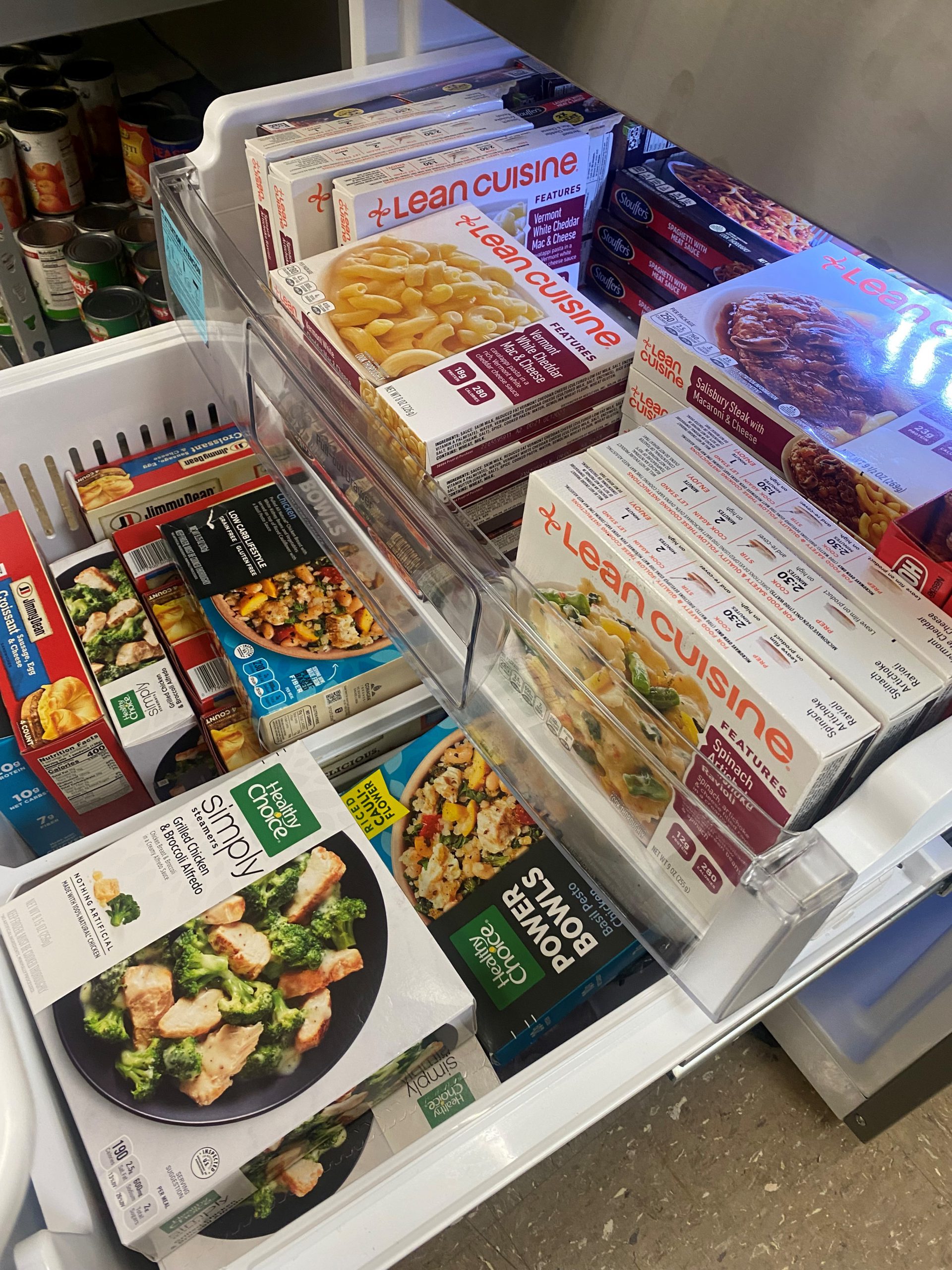 A wide variety of frozen meals are pictured in a freezer drawer in the Woodbridge Nighthawk Nest Food Pantry.