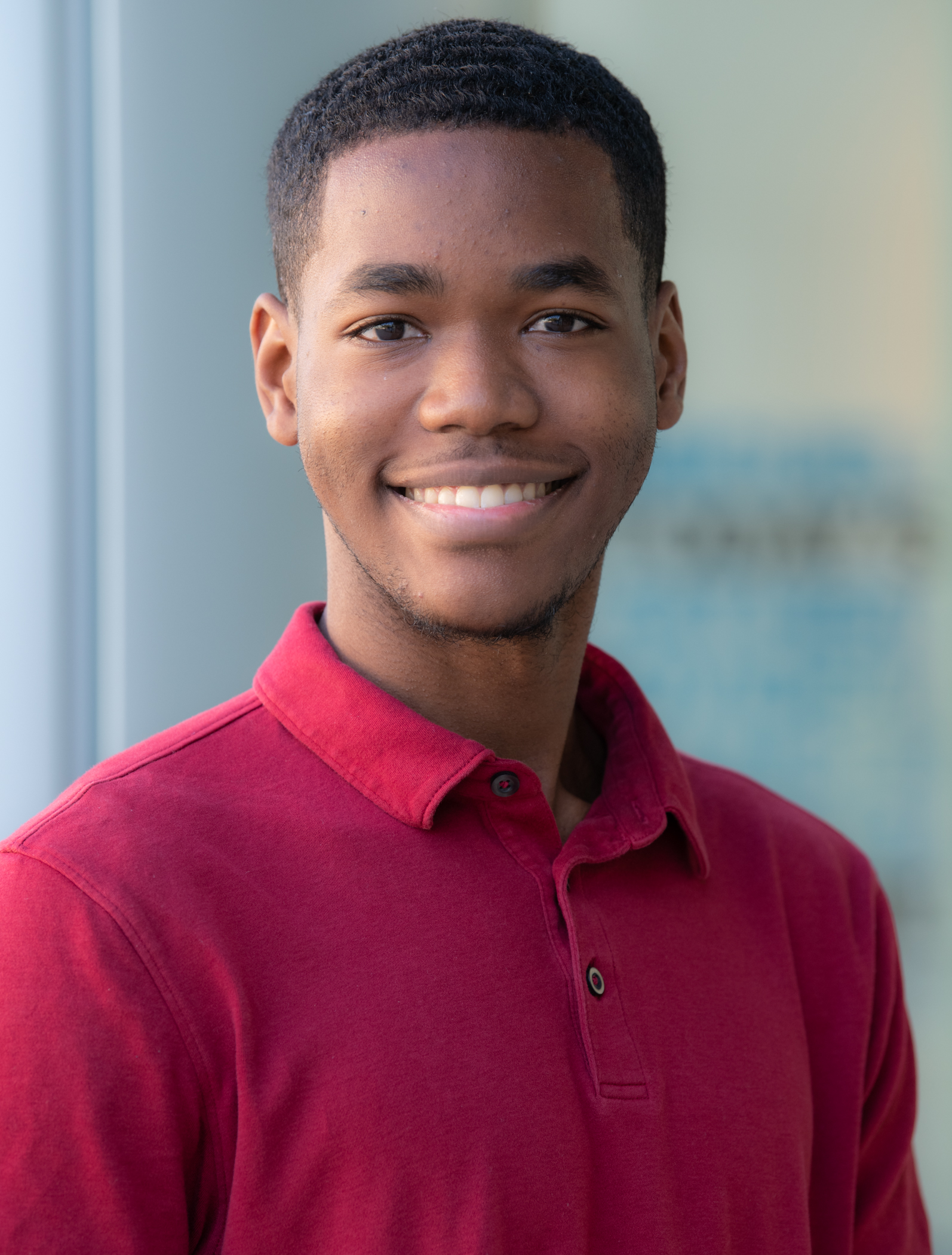 Photo of a smiling Asher Moore