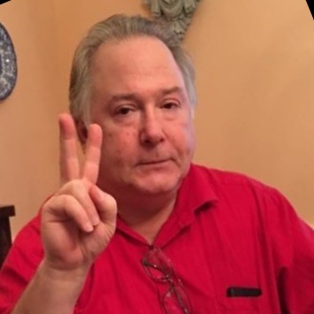 Kevin Mattingly gives the "Peace" symbol...ala "Peace Out."