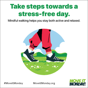 Square white graphic with the words "Take steps towards a stress-free day" in green at the top. Smaller black text below reads "Mindful walking helps you stay both active and relaxed." Center of image features a circular illustration of two feet, wearing black sneakers with white laces, walking on light green grass. Below the illustration, from left to right, are the hashtag #MoveItMonday, the URL MoveItMonday dot org, and the Move It Monday! logo in green and black. 