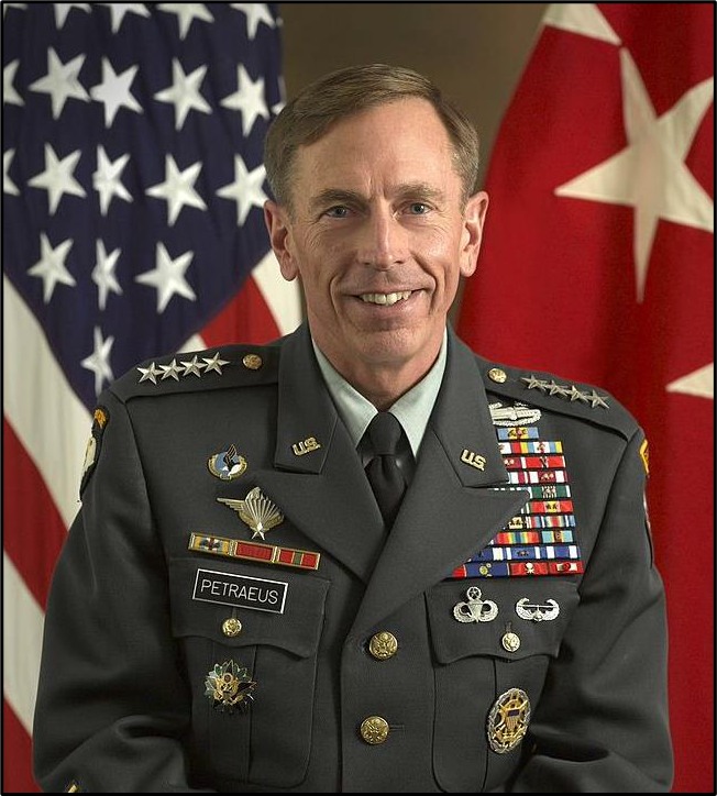 U.S. Army General David H. Petraeus smiles for his official portrait in front of a U.S. flag and a flag of a U.S. Army General (red background with four white stars placed horizontally across the center). Petraeus wears his U.S. Army uniform with placards of four stars on each shoulder and dozens of ribbons and awards adorning his chest