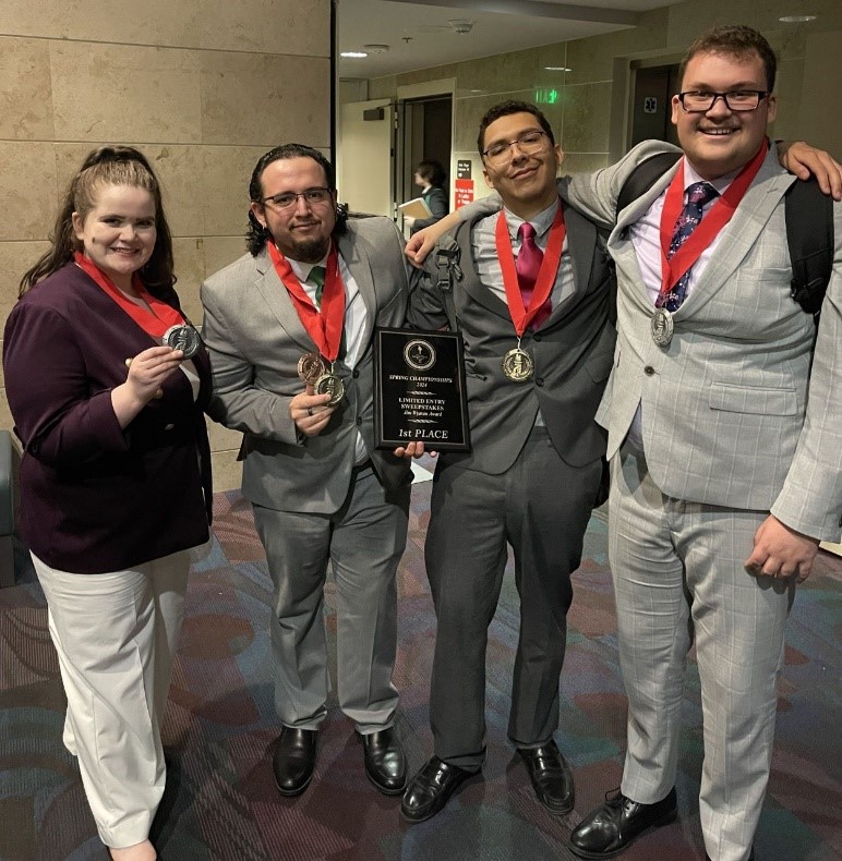 The four-member NOVA team line up and show their medals. From left, Cara Hillocks-Martinez, Denny Martinez, Joel Bucarey and Trey Phillips.