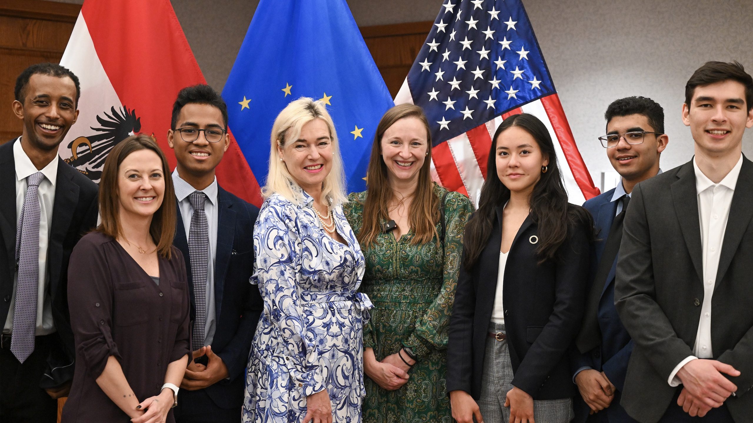Group lines up in front of US and Austrian flags: left to right-Jonatan Solomon Gebremichael, NOVA SkillsUSA National Champion; Mary Ratcliff, NOVA SkillsUSA Advisor; Andriamasinoro Misandratr’Avo, NOVA SkillsUSA President; Petra Schneebauer, Austrian Ambassador to the United States; Kristy Gillespie, NOVA IET Writer; Kanykei Korosheva, NOVA SkillsUSA Treasurer; Julio Gagnon, NOVA SKillsUSA Vice President; Benjamin Yam, NOVA SkillsUSA Reporter. Not pictured: Lee Satterfield, Asst. Secretary of State