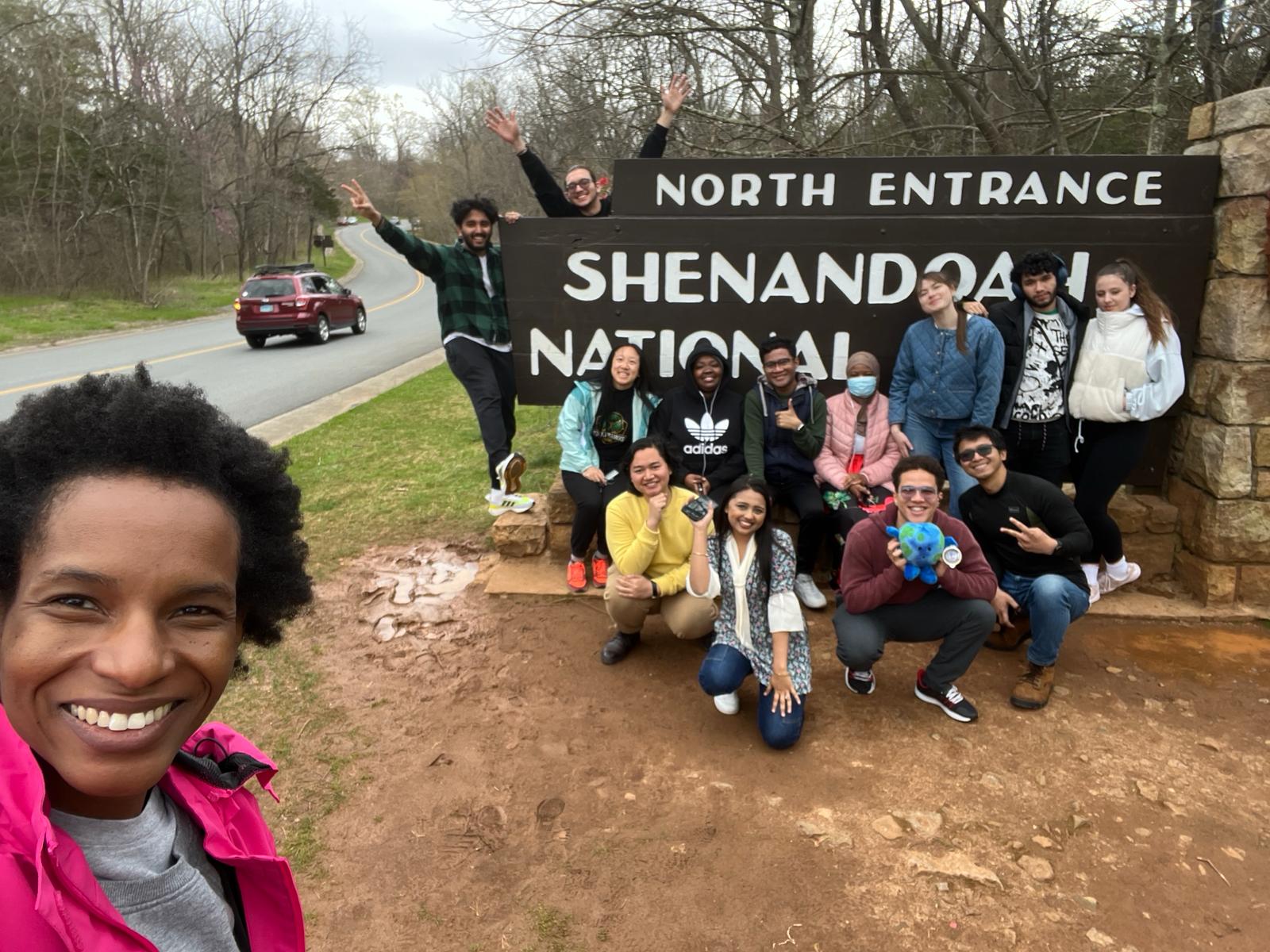 CCI program participants from NOVA's Alexandria Campus smile for a picture right outside the north entrance of Shenandoah National Park.