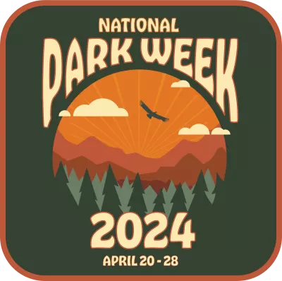 Illustration advertising National Park Week 2024:

In center is circular drawing with green pine trees in the foreground, warm-hued mountains in the middleground, and bright orange sunlight in the background. A large black bird and white clouds float above the mountains. 

The words "National Park Week" appear above the central illustration in rounded block letters; below the illustration are the words "2024: April 20–28"