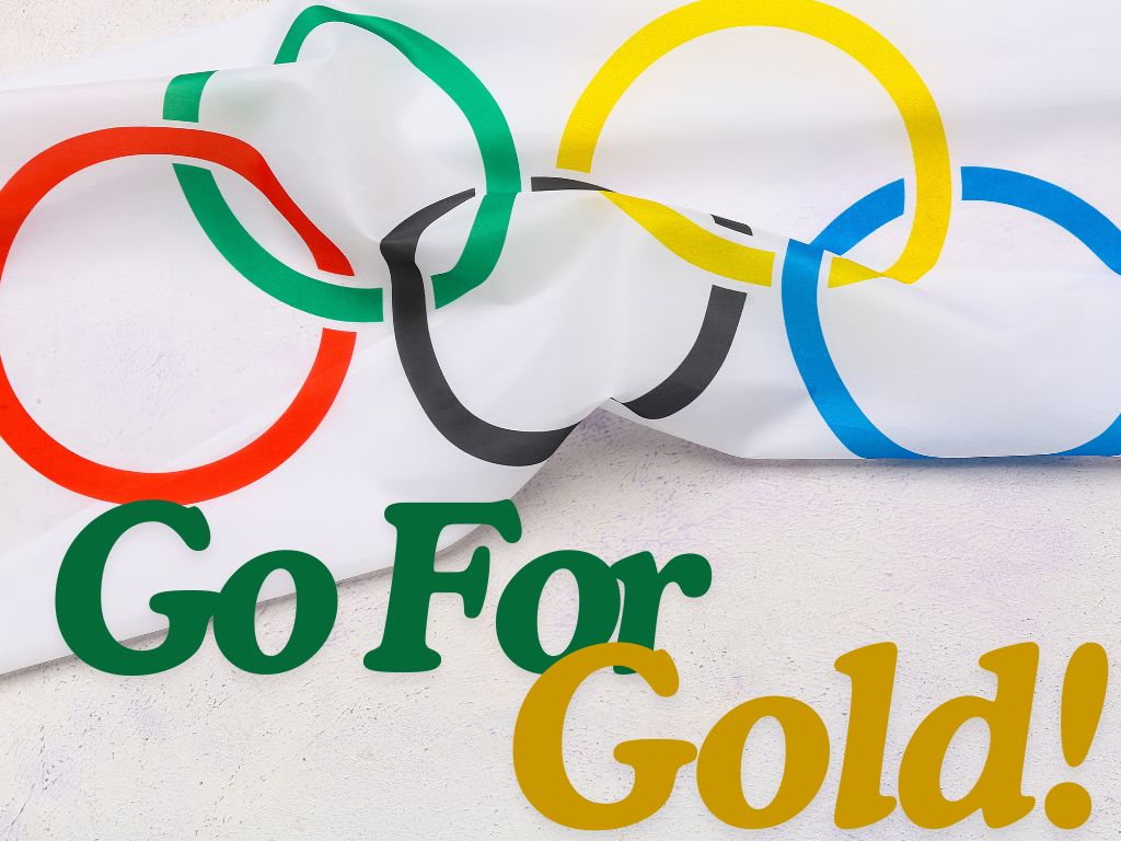 Stock photo of white flag bearing the Olympic rings against an off-white background. Under the flag are the words "Go for Gold!" in NOVA green and gold. 