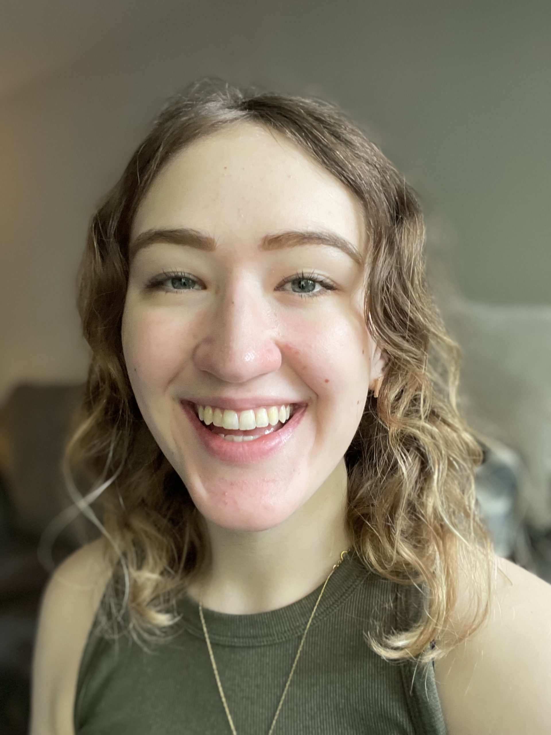 A beaming Cynthia Lionheart smiles for the camera