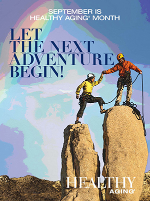 Healthy Aging Month illustration: Two hikers climb to the summit of two rocks with the view of a blue and lavender sky and a pastel rainbow. Text: September Is Healthy Aging Month. Let the Next Adventure Begin.  Healthy Aging .