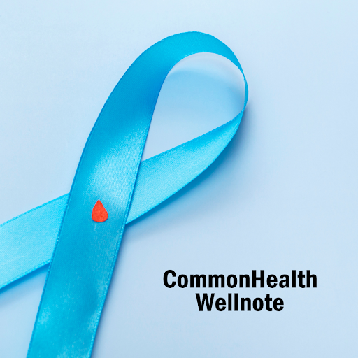 Square graphic showing a light blue awareness ribbon at left against a light blue background. At the center of the satin ribbon is a small red droplet, meant to symbolize a droplet of blood. The text "CommonHealth Wellnote" appears in black  at right of the ribbon. 